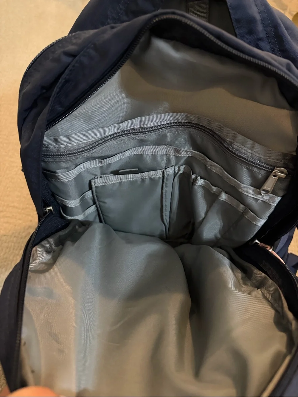 The North Face Navy Backpack with Pink Bungee Cord
